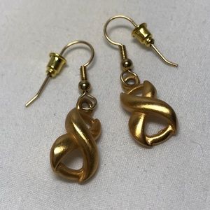 Anne Klein dangle earrings, measure 1 in, gold tone love knots